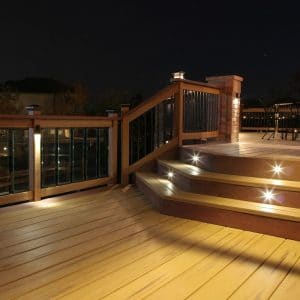 DEKOR® Recessed Stair Dek Dot™ LED Lights illuminating deck stairs