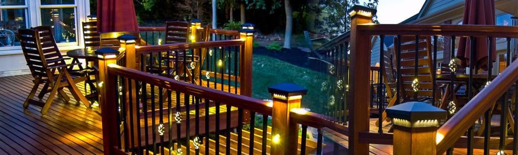 Wood deck featuring LED post cap lights