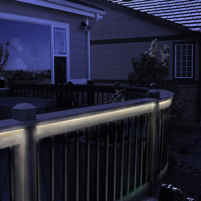 Dekor Custom Length Flex Deck LED Rope Light on deck railing.